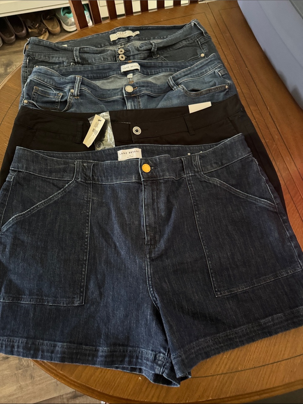 4 pairs plus size 22 shorts 3 denim 1 black twill 3 lane Bryant 1 torrid 1 NWT
